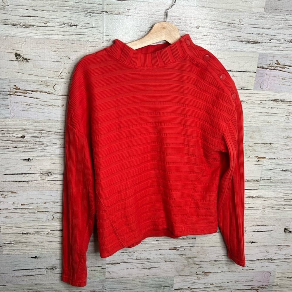 Anthropologie Maeve orange long  sleeve snap button size medium